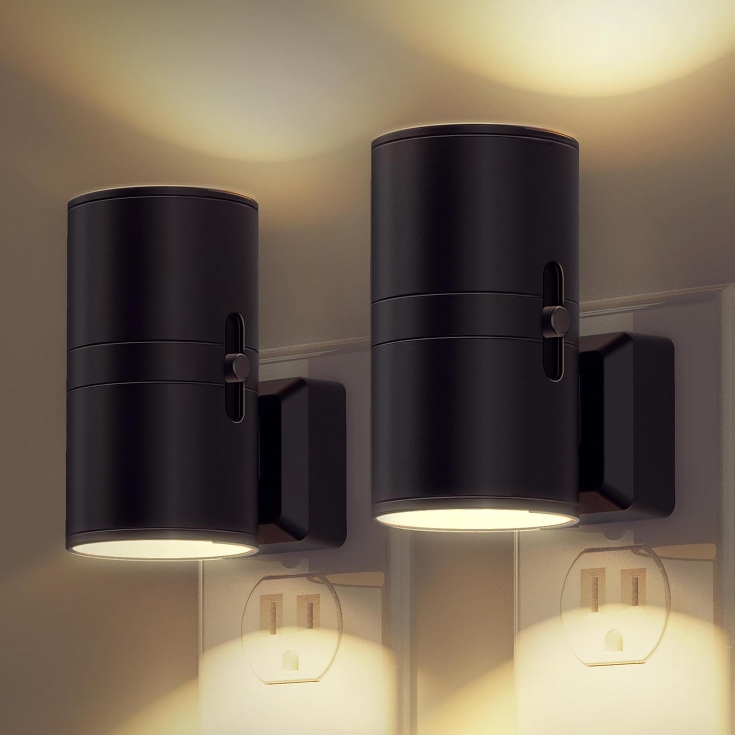 Two black wall-mounted outdoor lights on a neutral wall.