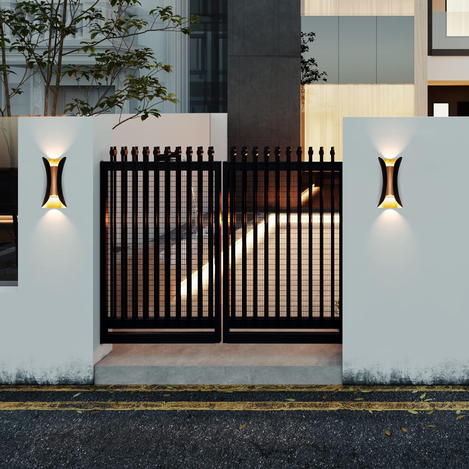 Modern black metal gate with wall-mounted lights on a building facade.