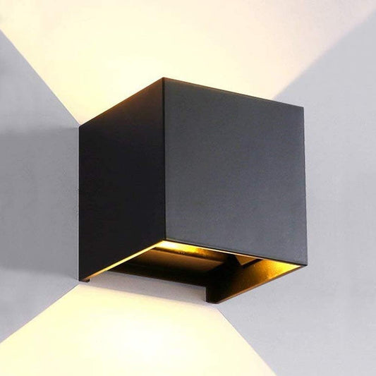 Modern black wall light fixture on a wall