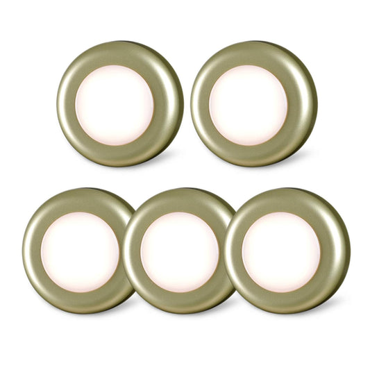 Set of five round light fixtures with a soft glow on a white background