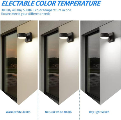 Three outdoor wall lights with different color temperatures on a building exterior.
