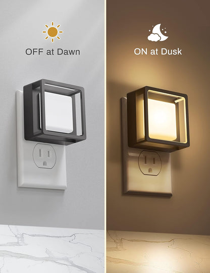 Two wall-mounted night lights showing 'OFF at Dawn' and 'ON at Dusk' on a gray and brown background.