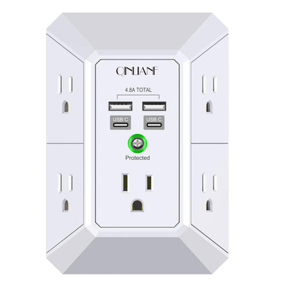 Wall-mounted electrical outlet with multiple sockets and USB ports on a white background