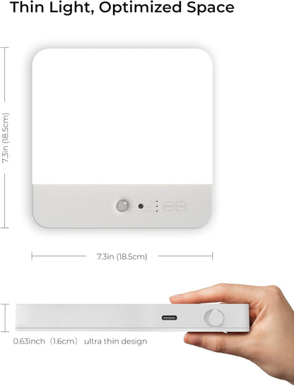 White electronic device with dimensions and a hand holding it for scale on a white background